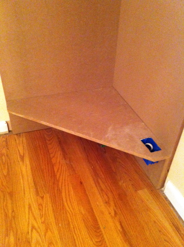Corner cabinet bottom shelf, with outlet box