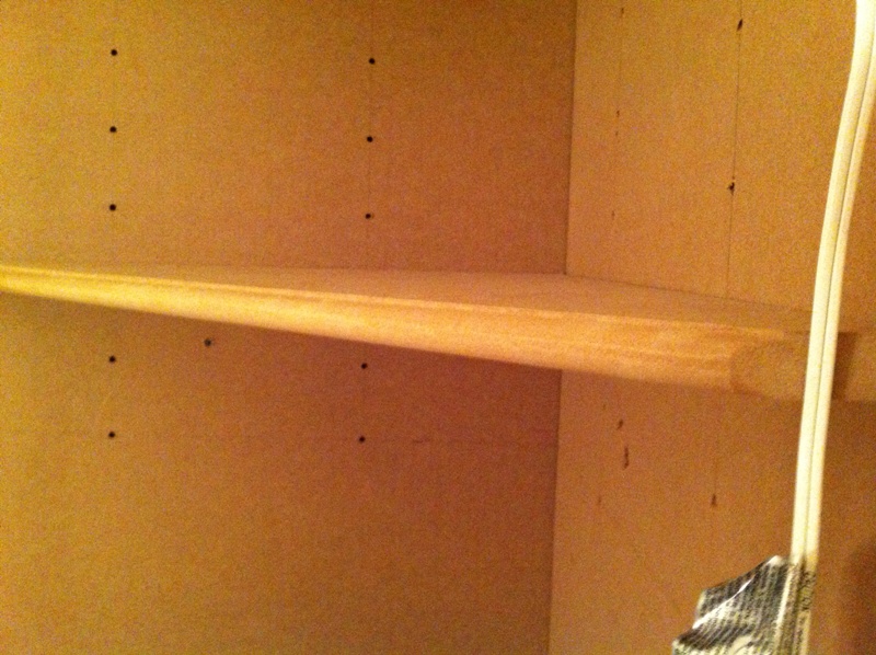 Corner cabinet adjustable shelf detail
